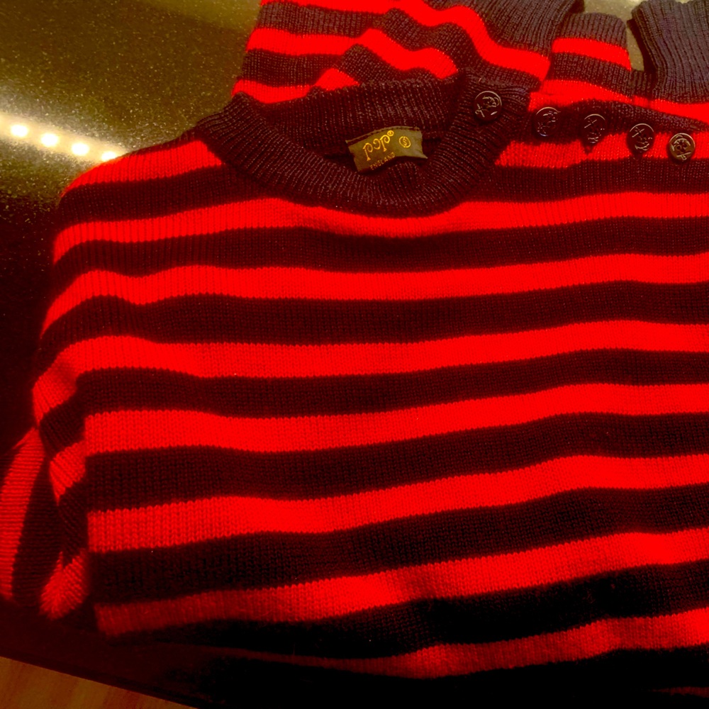 British brand, “Pop” Men’s red/blue crew neck sweater. It’s new/made of wool.